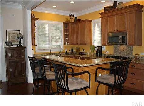 THE GOURMET KITCHEN IS INVITING FOR A GATHERING