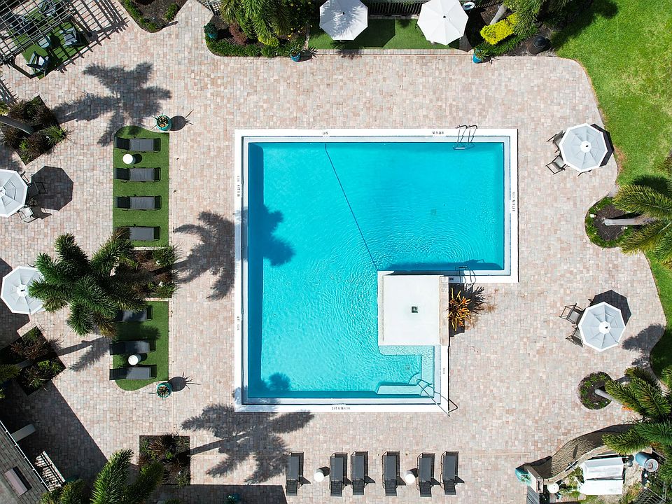 Our resort-style pool is the perfect oasis for relaxation, featuring spacious lounging areas and elegant landscaping. Experience premier living with top-notch amenities designed for your comfort.