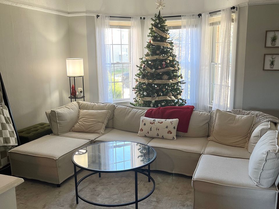 Living room with bay windows