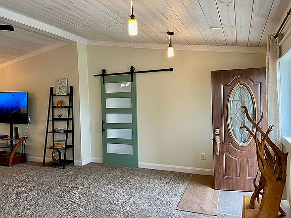 great room/barn door to den