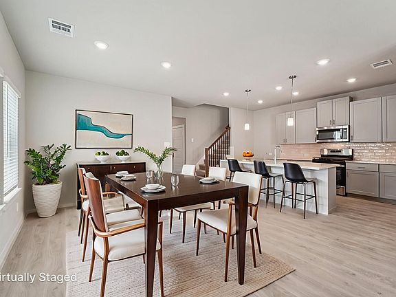 The Summerfield floorplan in Heights of Barbers Hill of Mont Belvieu, TX.