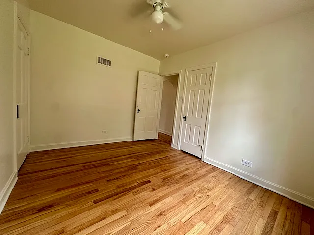 Bedroom 2 11' x 9'4"
Taken from south wall, looking out to hallway.
