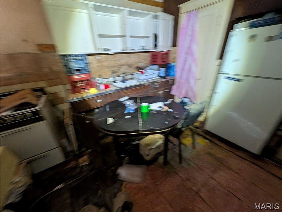 13th image of 5452 W Florissant Ave