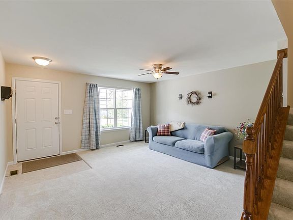 Enter into this large, bright living room!