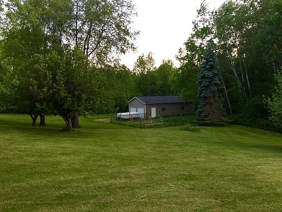Pole barn and fenced garden