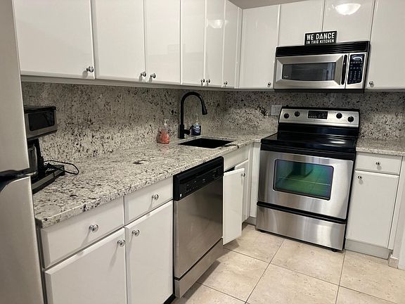 granite, no touch faucets, new appliances