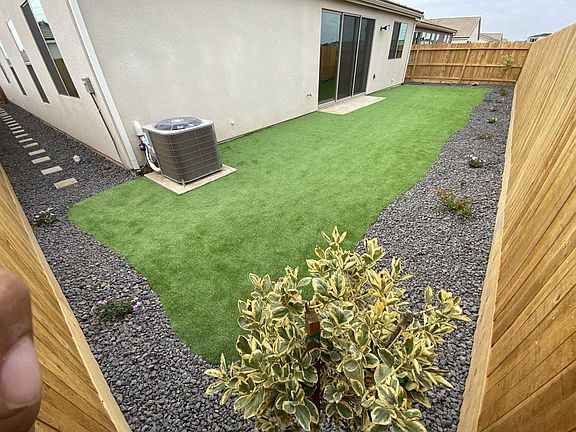 Synthetic grass with few drought resistant plans