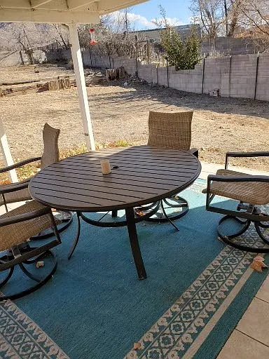 if rented furnished, patio table and four swivel chairs; all quality furniture