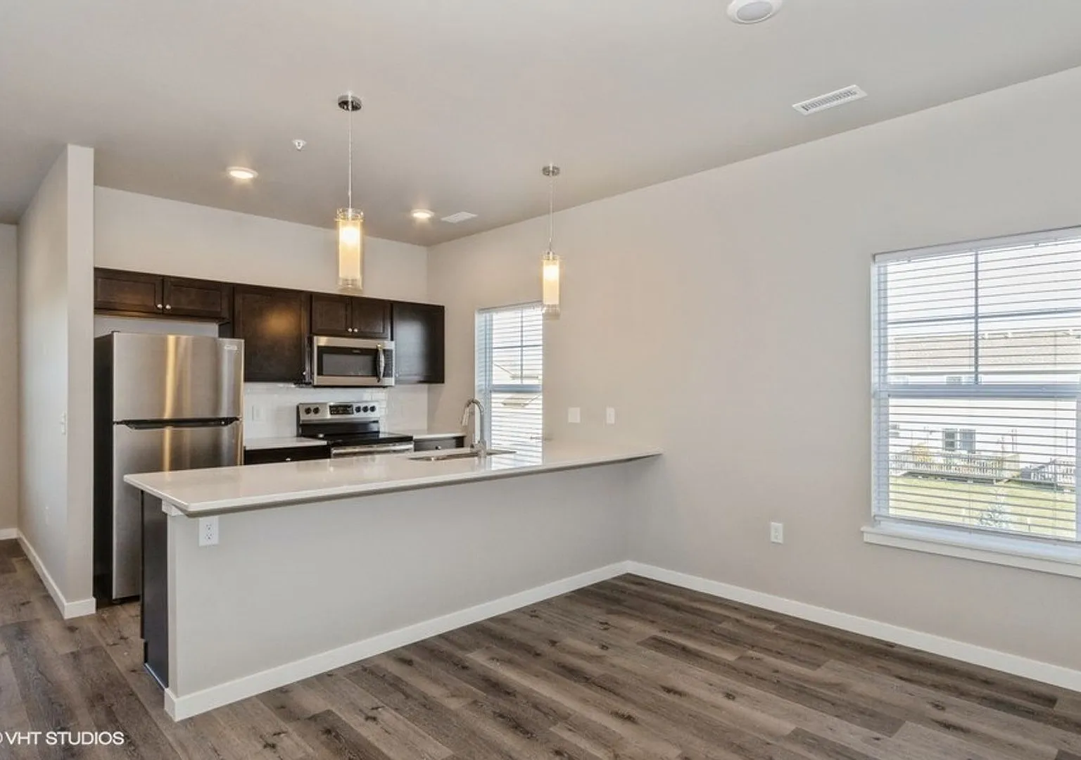 Big Ben Townhomes Brand New 2 & 3 Bedroom Townhomes | Attached 2-Stall Garage — Photo 4
