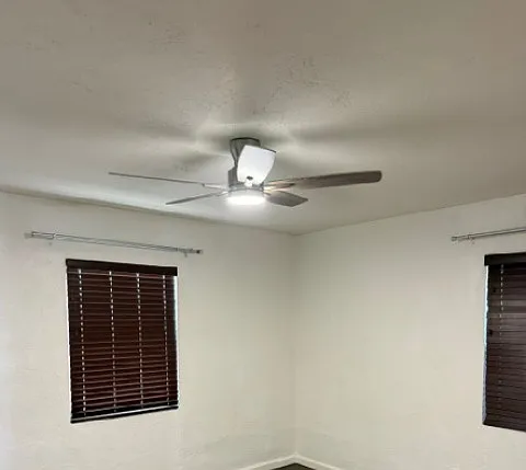new ceiling fan an curtain rods in bedroom #1