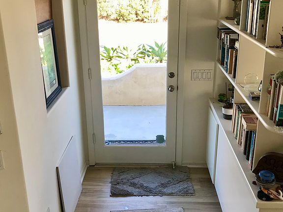 The front door is glass, and brings in lots of light!