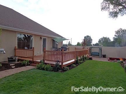 Rear of Home
						:
						Yard and large deck