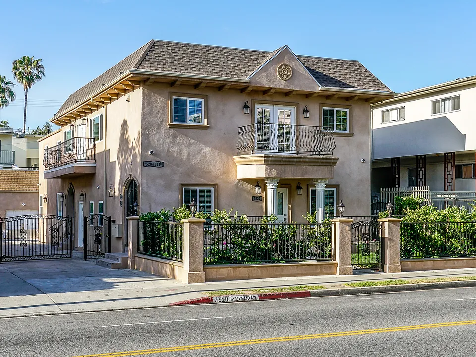 4 units building with subject unit on front top floor with balcony