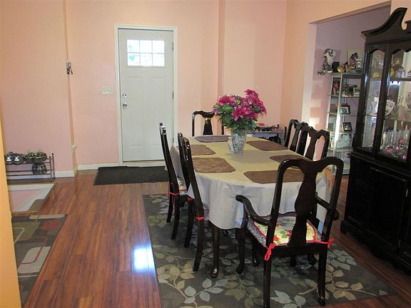 Open concept, laminate flooring.