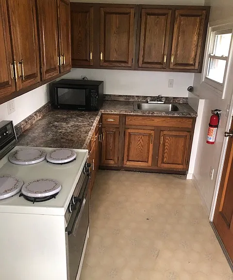 Second kitchen on 1st floor that does lead to back yard