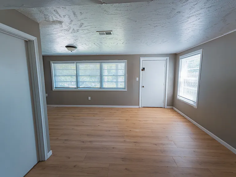 Downstairs Living Area/Office Space, with private garage entry point and private access door