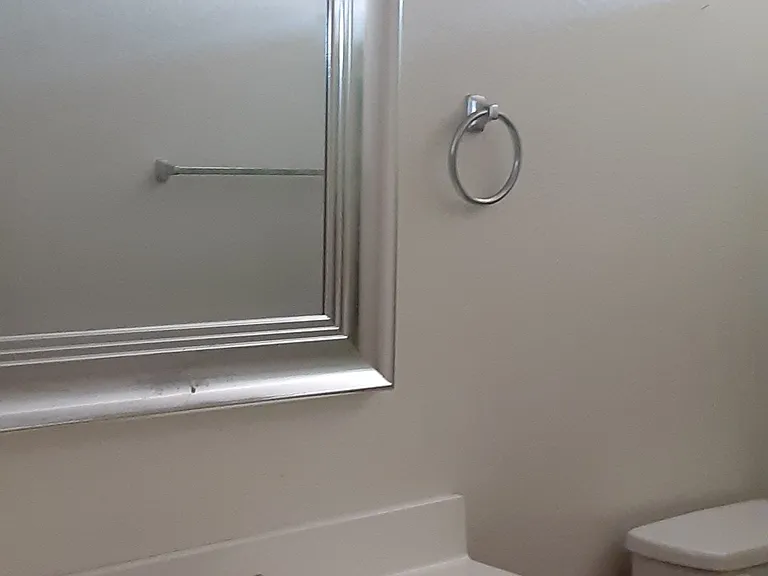 upstairs secon full BTH = with BTH tub/shower/sink storage cabinet