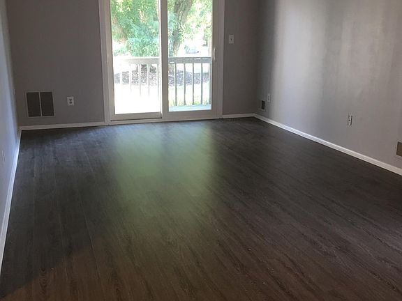 Living/dining room with slider to balcony