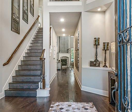 Two story entry and custom features greet your guests.