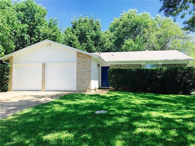 Lovely shaded front yard. Beautiful trees surrounding the property