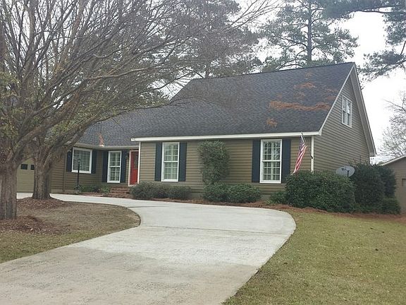 Side view with shop in background : Exterior painted 2013