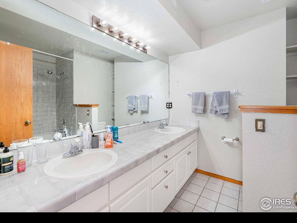 Attached full bathroom - double sinks, toilet, tub & shower