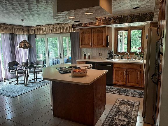 Kitchen looking to sunroom