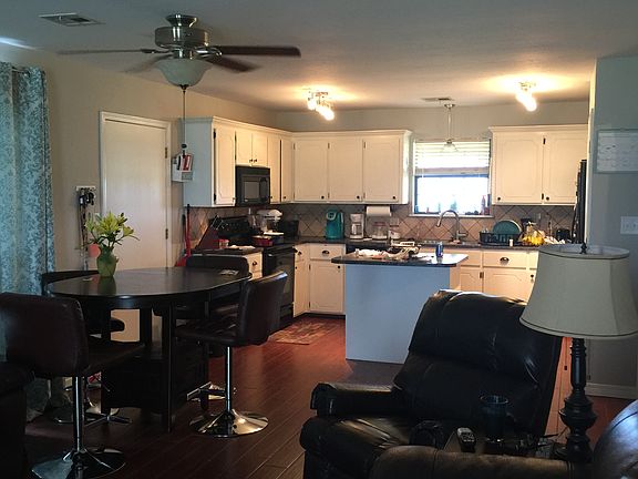 Living room to the kitchen