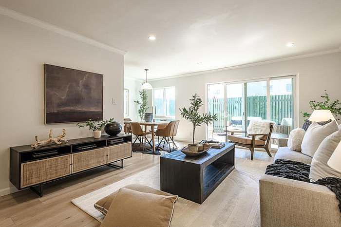 Living room. Photo is for reference only; no furniture is included.