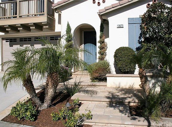 Beautiful steps & planters leading to this wonderful home
