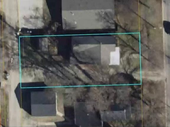 See alley and street access.