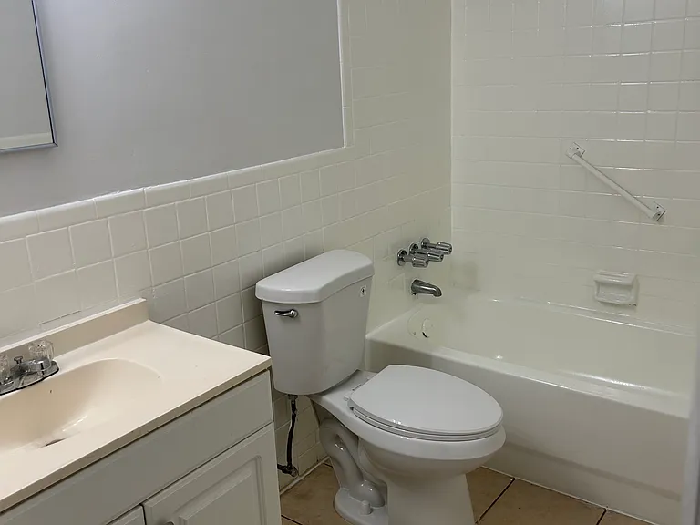 5634 NW 27th Ct — Photo 3