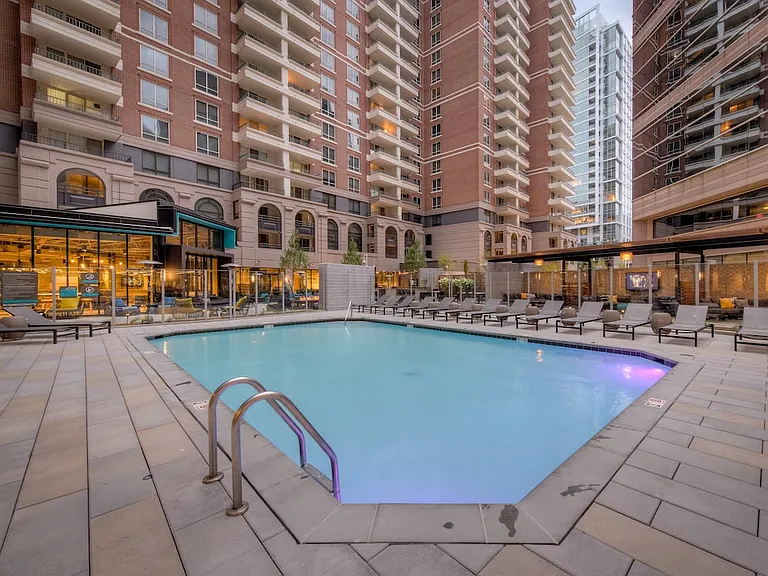 Courtyard with swimming pool and sundeck with lounge seating
