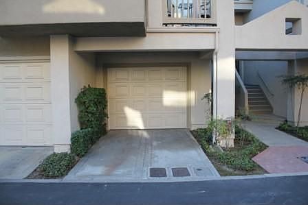 Attached garage w/ driveway