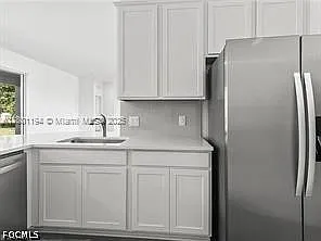 209 SE 26th Terrace Cpe — Photo 17