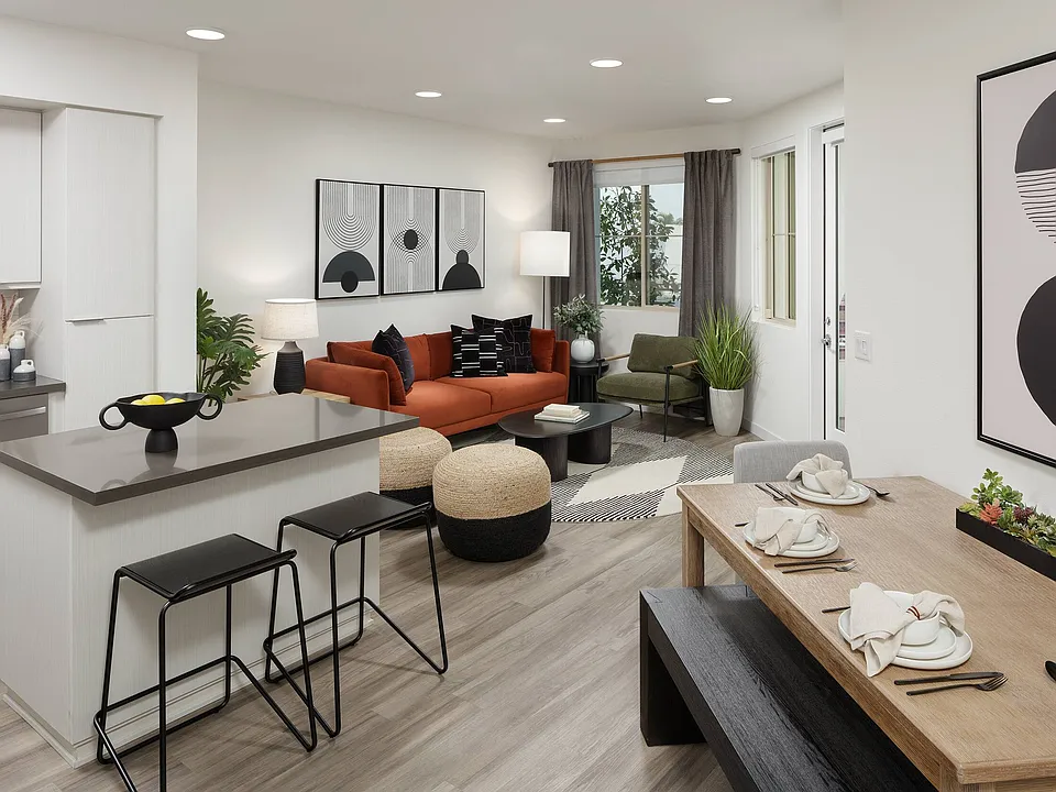 Cooking, dining, and relaxing come together in one open, light-filled space.