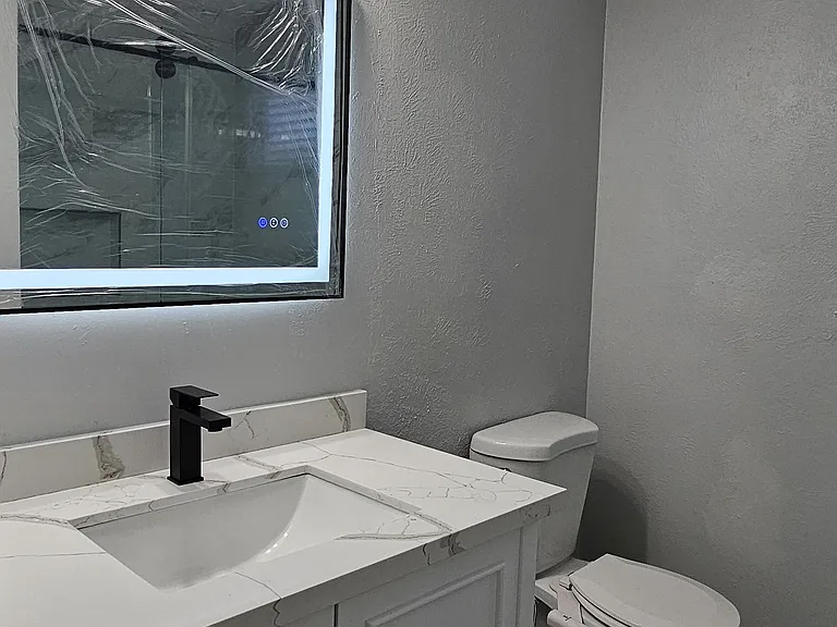 12. LED SmartMirror-Remodeled smart bath with granite vanity