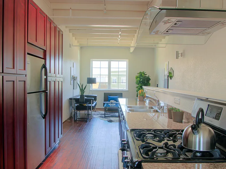Cabinets to store all your items - GE appliances - GAS STOVE - Fridge and dishwasher with Oven Range Hood