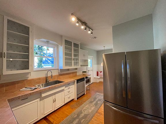KITCHEN WITH BRAND NEW REFRIGERATOR