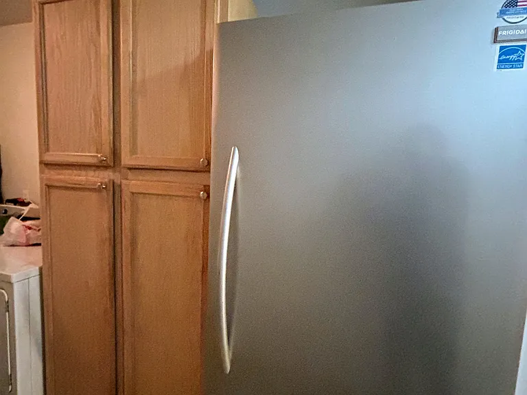 Full size freezer and extra storage cabinets