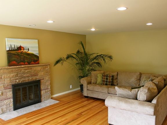 Fireplace is gas ready. New hardwoods. Across from couch is a built in seating area to enjoy the view~