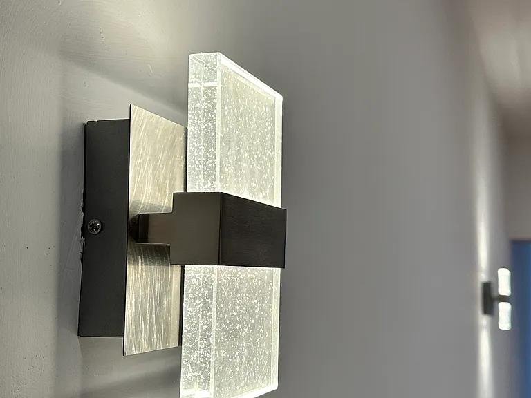 Accent lighting throughout for a warm, modern feel.