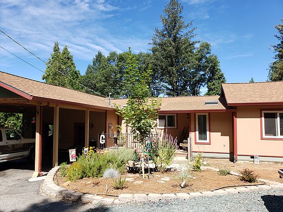 Carport with large workshop