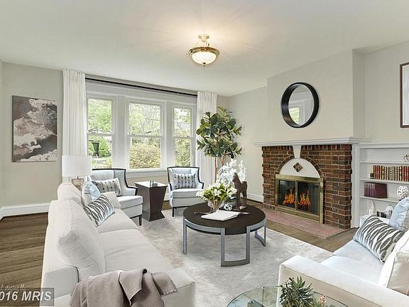 Living Room W/ Wood Burning Fireplace