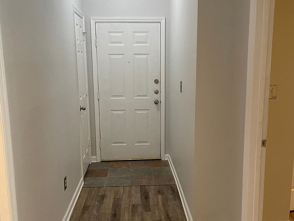 Front hall coat closet provides additional storage space