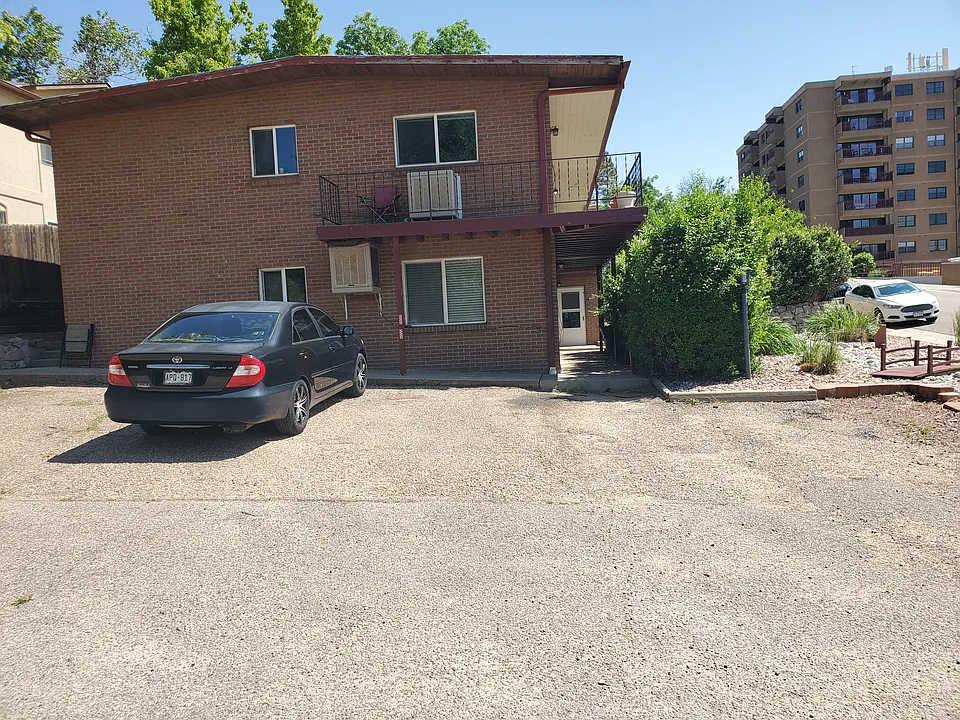 OFF St. parking area.
North of building 
Included in rent.