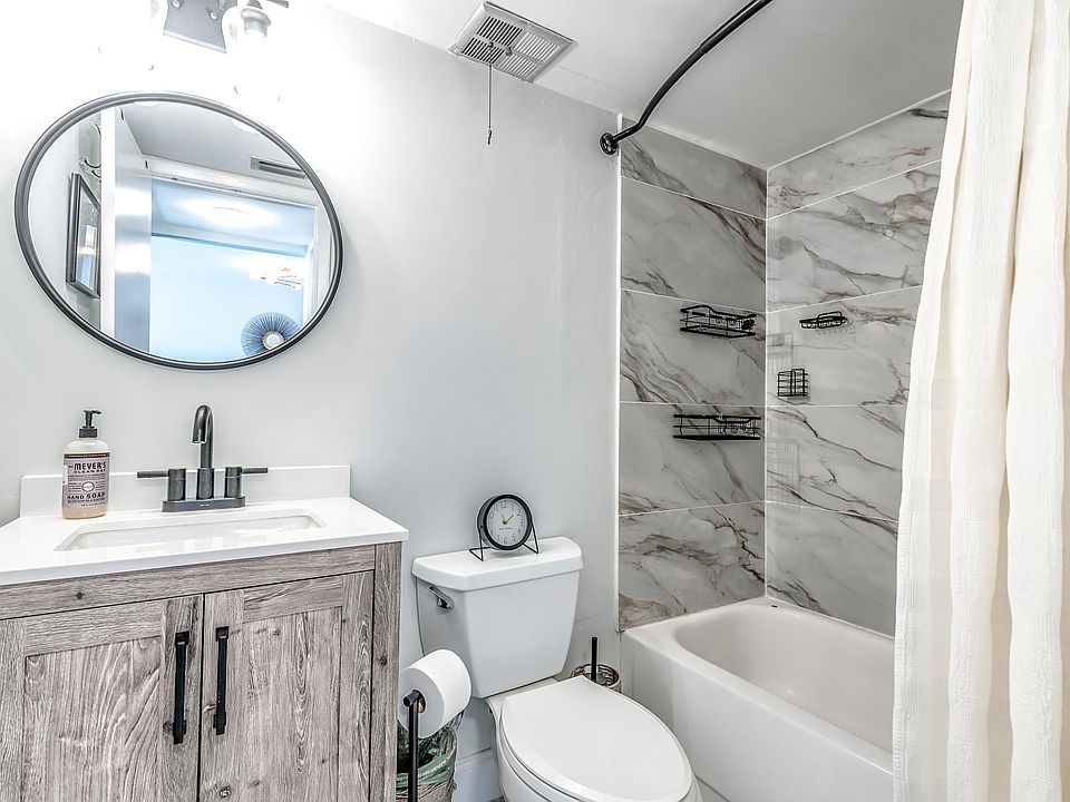 New vanity, faucet and lighting. Shower remodeled with new faucet and shower head. New marble flooring.