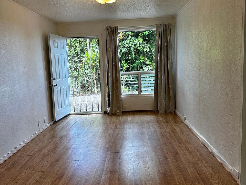 Front door with parking space