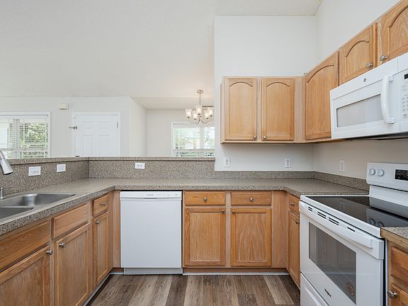 Kitchen- New stove and newer refrigerator and full pantry.