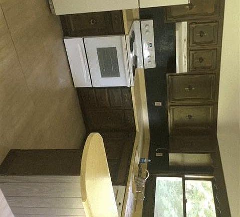 Kitchen with newer appliances, including a dishwasher. Lots of storage space! Floor is CORTEC-easier to care for than wood.